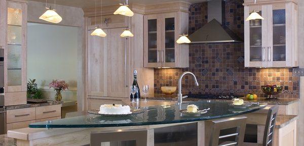 Custom-designed glass kitchen counters are one of the many products offered.