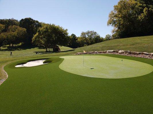 7000 sf green with sand filled bunker