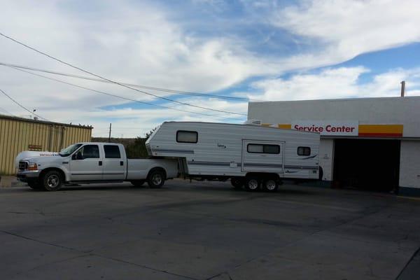 Tire bays were full so mechanic repaired our trailer wheel in an area by the Shell station next to the tire shop.  Easy and fast.