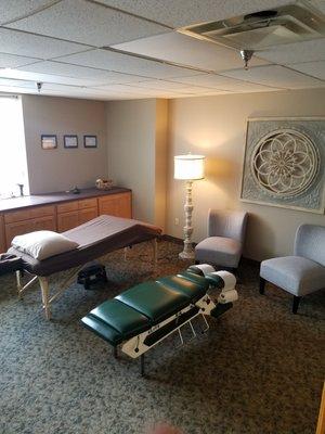 Spacious treatment rooms filled with natural light provide patients with a calm environment where they can decompress and heal.