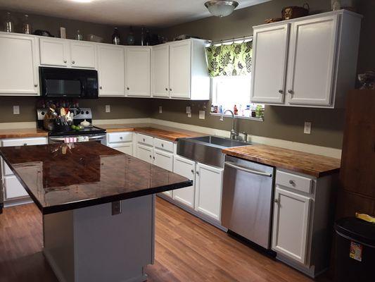 Kitchen remodel with custom butcher Block counters and island.