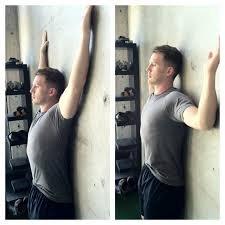 Wall Angels to prevent thoracic curvature of the spine.