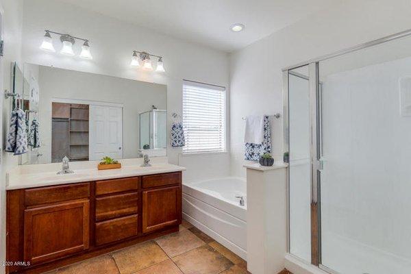 Dual sinks with large tub and step-in shower!