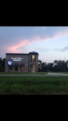 Beautiful picture of Park Place Pharmacy at sunset