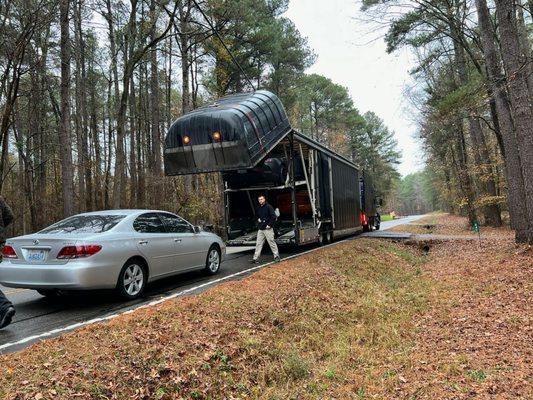 Lexus being delivered.