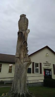 Our storm-damaged 100+ yr. old tree was  painstakingly carved it into the next generation of usefulness.