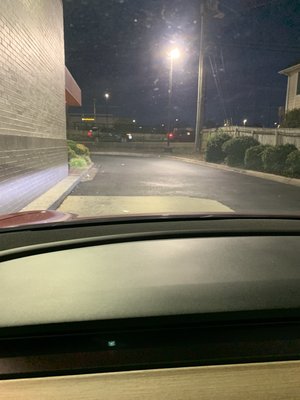 Trash in the ground going through the drive thru