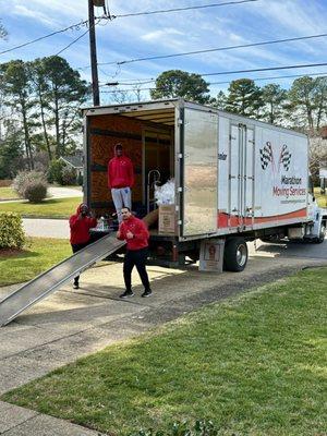 Unloading at the new address.