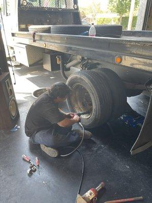 No job is to big for our techs here you see our tech David replacing all 4 rear tires on a customers tow truck.