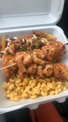 Shrimp skewer with golden fever fries and Mac