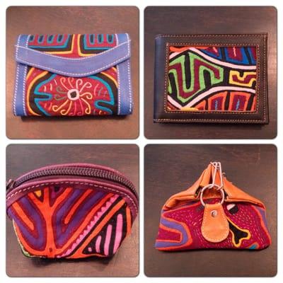 Handcrafted leather and mola coin purses from Colombia