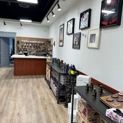 Explore our extensive range of top-quality barber supplies, from sleek scissors to state-of-the-art clippers, showcased under bright, welcom