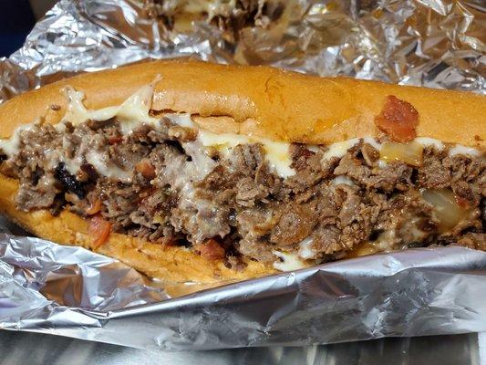 Brian's secret cheesesteak. Made with fresh garlic, hot cherry peppers , white cheese and delicious cheese steak