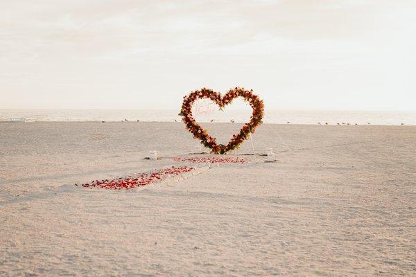 A luxury beach proposal at lido beach at The Ritz-Carlton