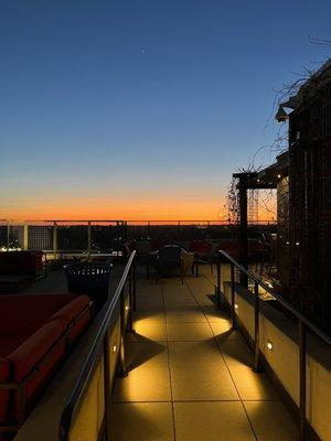 View of the rooftop deck from its gate, facing west