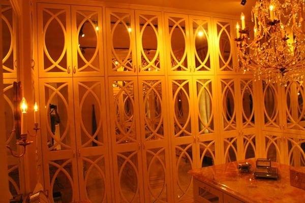 mirrored back wall in wine room