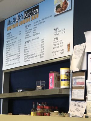 Side view of wall menu behind register.