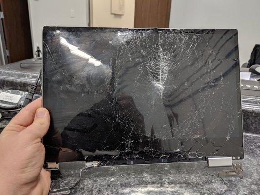 Customer brought in smashed laptop screen, this is a before the repair photo..