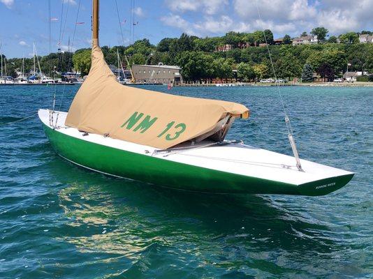 Northern Michigan one-design racing sloop showing custom boom/cockpit cover