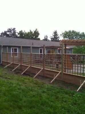 Custom fence and pergola installation for a client.