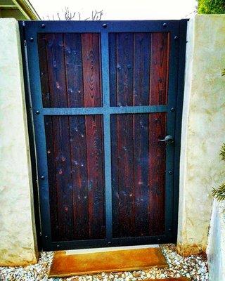 Custom metal and burned wood gate