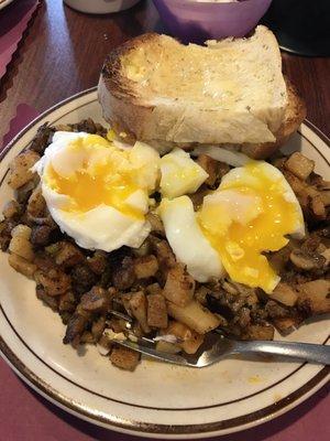 Prime rib hash with added Cajun seasoning, fresh poached eggs and Texas toast--outstanding.