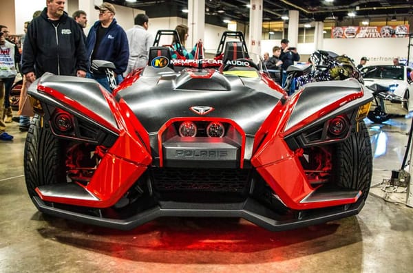 Polaris Slingshot with custom vinyl wrapping, custom LED lighting and custom sound. Definitely a beauty!