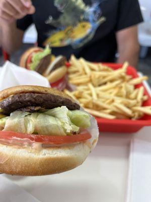 Cheeseburger and Double-Double in the background.