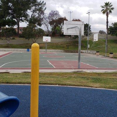 Basketball court behind play area