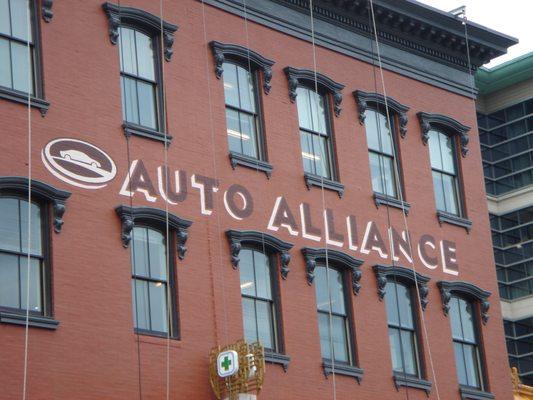 Custom lettering on building in Washington, DC. This project was completed using swing scaffolding.