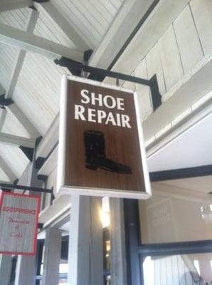 Shoe Repair in outdoor mall.