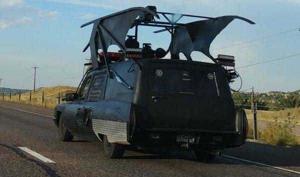 Batmobile/Hearse equipped with a 50 cal over the driver's front fender. These folks are ready for anything. We WONT be cutting them off.