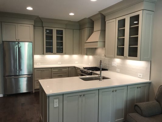 Pretty matched Quartz countertops and Cabinetry