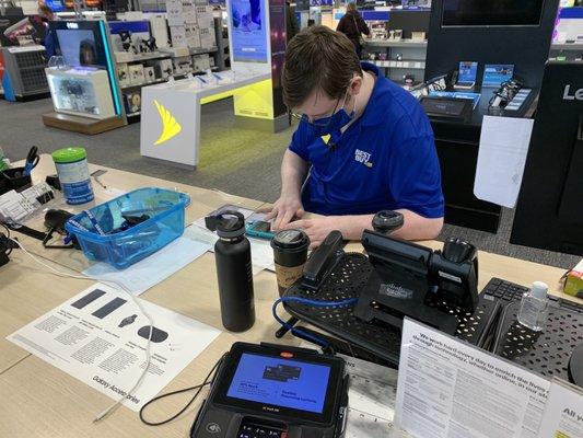 Brandon applying the screen protector PERFECTLY!