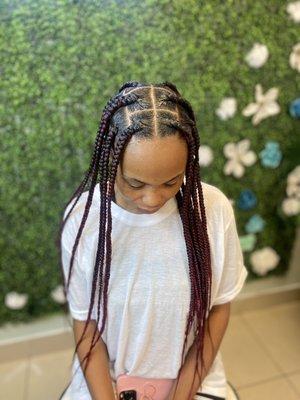 Large knotless box braids- beautiful protective style that allows your hair to rest while allowing your scalp to breathe.