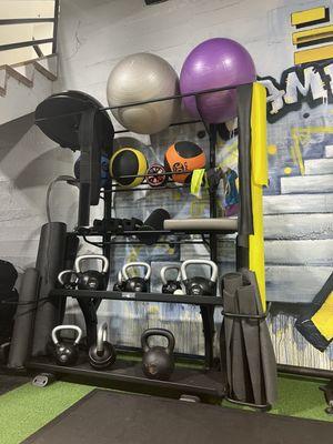 Kettlebells, yoga balls, resistance bands, foam rollers +