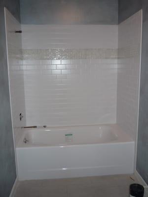 Subway tile in tub surround