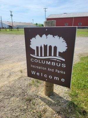 Signage at the entrance of the parking area.