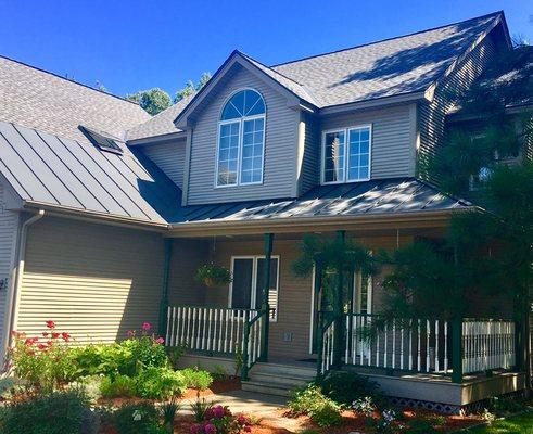 A custom GAF hybrid roof in colchester VT ( Drexel metal with GAF Timberline shingles ) Also Velux solar skylight