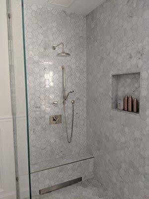 Polished nickel shower fixtures,