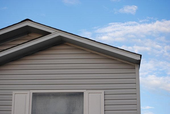 new vinyl siding installation on residential home