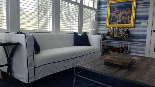 Going from dark chocolate colored fabric to this bright white and navy trim to beautifully fit in with this cozy room