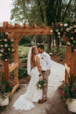 Wedding arch flower arrangements