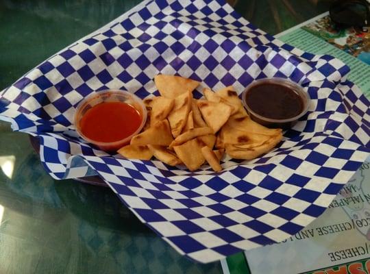 To start you off. Lightly fried pupusa dough with hot sauce & beans to dip.