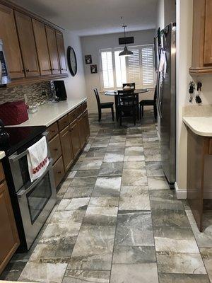 Just had this beautiful floor installed by Flooring Designs of Brockton. They ripped up old floor and installed new in one day.