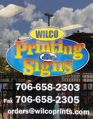 Wilco Printing & Signs - Braselton Can Install Vinyl on Windows & Doors!