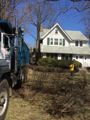 Truck used to deliver materials and also, taking debris