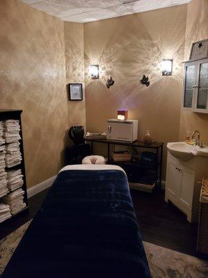 Comfortable and Cozy massage room for one.