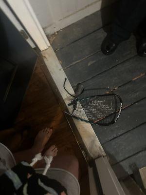 The racket he left for me and the police to find.