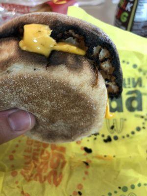 Yum...  Burned Egg McMuffin that was served to me...